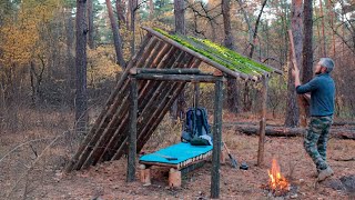 A man builds a log cabin in the forest Shelter made of logs Part 1 [upl. by Atiral]