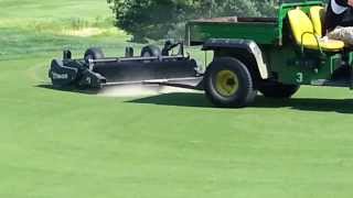 Golf Course greens aeration  brushing in the sand [upl. by Coveney]