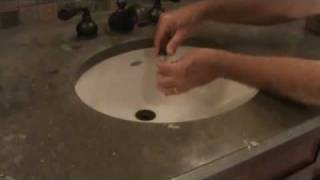 How to clear out a sink drain Removing the pop up valve [upl. by Alano]