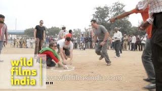 Indian traditional game pitthu or Seven stone played at Pushkar fair Rajasthan [upl. by Verbenia]