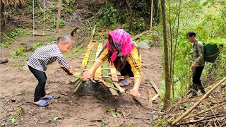 The happy child helps the woman fence the vegetable garden while the man sells wild vegetables [upl. by Whipple]