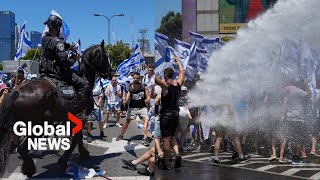 Israel protests Police use water cannons on antigovernment demonstrators in Tel Aviv [upl. by Nnalorac]