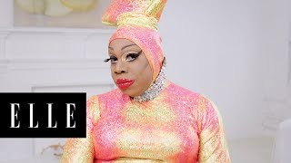 Watch Drag Queen Vivacious Makeup Transformation  About Face  ELLE [upl. by Pomcroy]