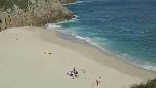 Porthcurno beach lifeguard base and cable hut Cornwall England [upl. by Ahsirek]