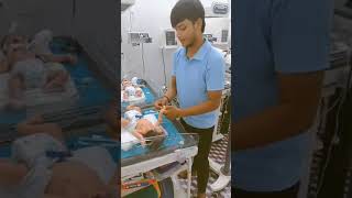 I v cannula insertion procedure in a newborn [upl. by Cira]