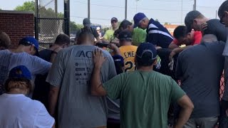 Touching Photo Shows Democrats Praying for GOP Reps Shot at Baseball Practice [upl. by Hut]