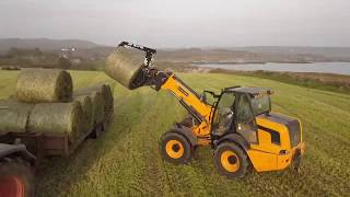 First Cut Silage 2019  Fendt amp McHale Baler JCB TM310S Loading Bales [upl. by Clerissa314]