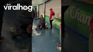 Two Men Slip And Slide On Wet Floors  ViralHog [upl. by Larry949]