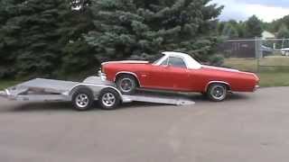 Aluma 8218 Tilt Tandem Axle Utility Trailer Loading El Camino [upl. by Yrolam]