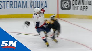 Alexander Ovechkin Sends Brad Marchand Flying With Massive Crunch [upl. by Euqinitram]