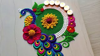 1185 Peacock rangoli designs for diwali  satisfying video  Sand art [upl. by Llatsyrk519]