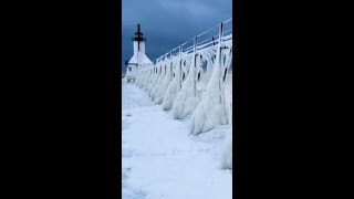 Storm Leaves Michigan Lighthouse and Pier Covered in Ice [upl. by Merry]