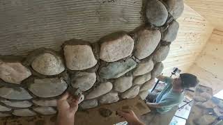 Fieldstone fireplace  slinging rocks  above the mantle [upl. by Dyol]