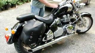 Bafflectomy Triumph 2002 Bonneville America muffler mod sound clip [upl. by Atiraj]