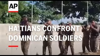 Haitians confront Dominican soldier at the border [upl. by Electra]