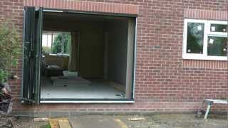 Bifolding doors with integral blinds from Solarfold Bifolding doors [upl. by Neelhsa]