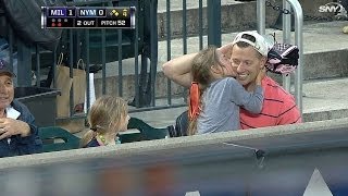 MILNYM A young Mets fan hugs dad for catching ball [upl. by Alyekahs623]