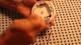 How to Replace the Battery in Honeywell quotRoundquot Thermostats [upl. by Darcia]