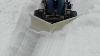 VPlow Snow Removal Attachment  Grasshopper Mowers [upl. by Ativla]