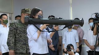 President Tsai Ingwen shoulders a Taiwanmade bazooka  AFP [upl. by Sillihp]