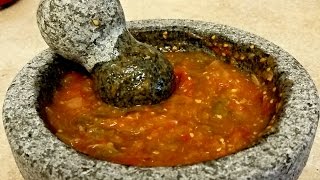 Salsa de Molcajete  How to use a molcajete [upl. by Ruhtracm]