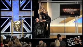 Sacha Baron Cohen  Charlie Chaplin Britannia Award  pushes woman in wheelchair off stage at awards [upl. by Hsetih]