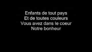 Enrico Macias  Enfants de Tous Pays  Lyrics [upl. by Essirahs809]