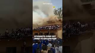 Students jump from roof to save their lives in school fire in DRC [upl. by Rodablas]