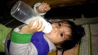 Baby drinking milk by bottle [upl. by Annayak]