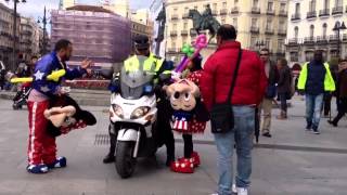 Costumed performers attack heckler in Madrid [upl. by Refinnej]