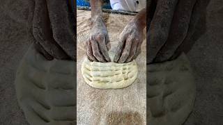 How to shape bread in a bakery by hand [upl. by Aleibarg]