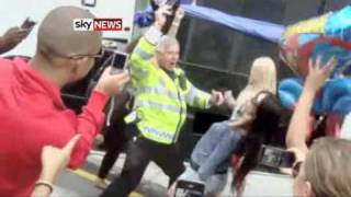 CAUGHT ON CAMERA  POLICEMAN DANCES WITH REVELLERS AT NOTTING HILL CARNIVAL [upl. by Skricki901]