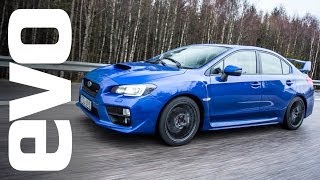 Subaru WRX STI first drive review rally legend  evo REVIEW [upl. by Ynatil]