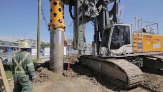 Liebherr LB 24 and LB 28 installing seacant pile wall using segmental casing [upl. by Eelyah61]