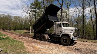 Digging a swale and putting down shale [upl. by Cassiani826]