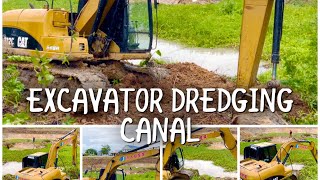 EXCAVATOR DREDGING CANAL [upl. by Yerffej334]