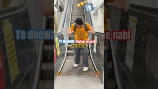 Wall prank escalator prank public reaction handstyles publicreaction shorts [upl. by Suivatna]