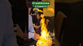 Cherries jubilee flambé food steakhouse [upl. by Ahsinrat]