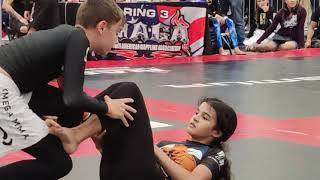 JiuJitsu finals grey belt girl chokes orange belt boy wins by points [upl. by Rennat919]