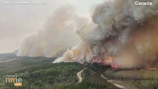 Canada Wildfire  Dangerous Smoke Cloud  Canadian Crews battle wildfire in remote town  News9 [upl. by Eloccin]