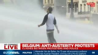 Police drench protesters with water cannons at Belgium Antiausterity demonstration [upl. by Frohman270]