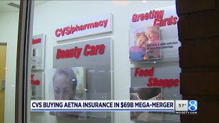 How CVS buying Aetna could affect you [upl. by Emmuela414]