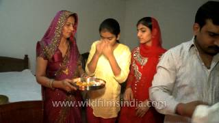 Indian family praying together on Diwali festival [upl. by Alikee]