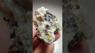 Pegmatite with Garnet and Titanite crystals Canada [upl. by Olivann459]