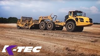 KTec 1233ADT Scraper Self Loading Overburden with Volvo A40Ffs [upl. by Kenrick806]