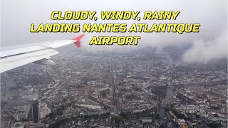 CLOUDYWINDYRAINY LANDING  NANTES ATLANTIQUE AIRPORT  VOLOTEA A319111 ECMUC  DOWNTOWN VIEW [upl. by Yelir]