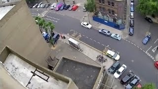 Friday Freakout BASE Jumper Strikes Building Lands On Road [upl. by Sissie624]