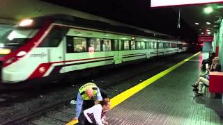 Renfe Train Torremolinos Station Spain Woman walks in front of train [upl. by Deelaw621]