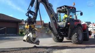 Asphalt work in a residential area with a HUDDIG 1060C [upl. by Am]