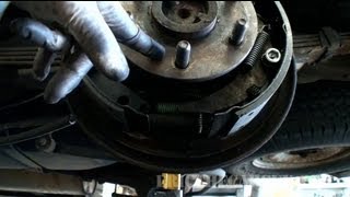 1999 Chevy Tahoe Rear Shoe Replacement Part 2  EricTheCarGuy [upl. by Enoob521]